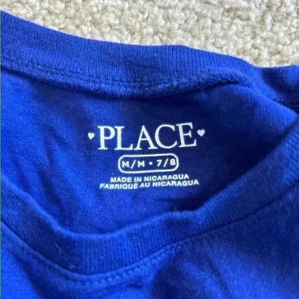 Place Purple First of First Grade t-shirt size 7/8